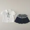 2026 Estilo Coreano Meninas Bebês e Crianças Verão Novidade Conjunto de Camiseta Cartoon e Saia Curta Infantil Conjunto de Duas Peças para Bebês Meninas Tendência
