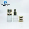 En stock Botella redonda recta de fondo grueso y hombro plano de 10 ml, cabeza de bomba, botella transparente para aceites esenciales, botella de esencia de base, botella para subdividir para viajes
