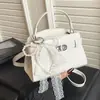 Bolso de Mano Transfronterizo Nuevo Retro de Lujo Ligero para Mujer, Bolso de Hombro Versátil de Venta Caliente en Primavera, Bolso Cruzado de Gran Capacidad para el Trabajo