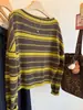 Nuevo suéter de punto a rayas de bloques de color de lana pura estilo invierno para mujer, estilo europeo, suéter de moda de manga larga con hombros descubiertos, versátil