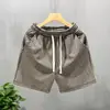 Shorts de pata de gallo para hombre de marca casual de lujo, nuevo estilo verano 2025, shorts de playa rectos holgados de cuatro puntos, pantalones casuales retro