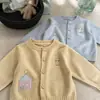Cárdigan de punto para niña, nuevo estilo otoño 2026, ropa exterior para niños, suéter súper lindo de dopamina para primavera y otoño
