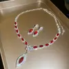 Pendientes y Conjunto de Collar de Piedras Preciosas Esmeralda Brillantes con Diamantes, Cadena de Clavícula de Lujo Ligero de Nicho, Conjunto de Joyería Estilo Palacio para Mujeres