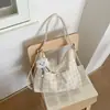 Bolsa Nova Estilo Fresco Primavera 2026 para Axila e Ombro para Mulheres com Laço, Bolsa Tote para o Trabalho, Bolsa Pregueada, Bolsa Transversal