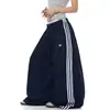 Pantalones de chándal deportivos de retazos a rayas para mujer y hombre, pantalones de baile holgados de pierna ancha para otoño, pantalones versátiles y adelgazantes de largo completo
