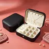 Nuevo en stock estuche portátil de cuero para joyería con espejo, caja expositora con accesorio de broche, caja de almacenamiento para anillos y accesorios para el cabello de niñas