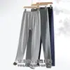 Pantalones largos para estudiantes varones invierno estudiantes de secundaria pantalones cálidos mallas interiores para hombre
