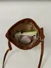 Bolso de mano para mujer 2026 otoño nuevo estilo coreano retro bolso de axila moda femenina nicho bolso tote cubo bolso de hombro bandolera