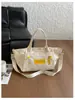 Bolsa de lona estampada de gran capacidad, bolsa tote versátil para mujer, nuevo modelo de verano, bolso de hombro de aspecto elegante, bolso cruzado de moda