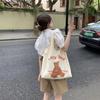 Bolsa de Ombro Grande Capacidade Laranja Estampada Artística Estilo Fresco Bolsa de Lona Portátil para Compras Vaca Fofa Redutora de Idade Doce
