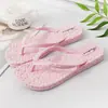 Zapatillas de masaje con flores, zapatos de mujer, chanclas de verano nuevas, sandalias de playa planas de color sólido a la moda para mujer, venta al por mayor de marea