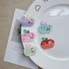 Nuevos Accesorios de Gato de Dibujos Animados Serie Manzana al por Mayor Hechos a Mano DIY Pegamento de Crema Pinzas para el Cabello y Zuecos para Niños