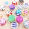 Lentejuelas de chocolate de dibujos animados transfronterizos japoneses y coreanos Colgante de resina M Bean Accesorios Pulsera personalizada Colgante Material DIY