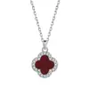 Joyería Explosiva de Plata de Ley S925 Collar de Trébol de Cuatro Hojas para Mujer Nicho Lujo Ligero Moda Simple Colgante de Ónix Negro y Fritillaria Blanca
