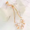 Pulsera de Moda Estilo Lujo Ligero Japonés y Coreano Color Dorado Cdd con Perlas de Imitación y Pedrería, Diseño Deslizante, Directo de la Fábrica Fuente