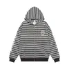Sudadera con capucha a rayas estilo americano para hombre, corte holgado, adecuada para primavera y otoño, con un diseño inspirado en lo gótico que presenta estampados de letras sánscritas y una cremallera