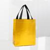 Bolsa de mano no tejida de color sólido aluminizada laminada con láser transfronteriza al por mayor bolsa de regalo bolsa de compras