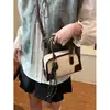 As bolsas pequenas populares deste ano para mulheres, versáteis para outono e inverno 2026, nova moda retrô, bolsa de ombro único, bolsa transversal, bolsa de mão, bolsa almofada