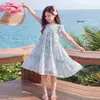 Vestido de Verão para Meninas 2026 Novo Estiloso Vestido Infantil para Meninas Mais Velhas Doce Vestido Floral com Laço de Verão
