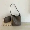Nuevo Modelo 2026: Bolso de mano casual versátil con textura retro de alta gama, bolso tejido versátil de un solo hombro para llevar debajo del brazo
