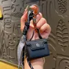 Llavero Colgante para Bolso Cadena para Teléfono Móvil Cachorro de Cabeza Chueca de Cuero PU Personalizado de Nicho Adornos de Alta Gama para Mujer