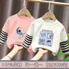 Camiseta de manga larga de algodón puro con retazos para niños, nuevo estilo primavera/otoño, diseño de dibujos animados, casual y versátil, parece un conjunto de dos piezas, moderno