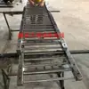 Tambor de Aço Inoxidável Descarregamento de Água Engarrafada Rampa de Descarregamento Rampa de Descarregamento Polia Manuseio Rolo de Carregamento e Descarregamento
