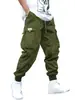 Pantalones holgados de moda para comercio exterior en sitio web independiente con diseño de bolsillo tridimensional, pantalones jogger para hombre, versátiles para deportes al aire libre, en stock para venta al por mayor
