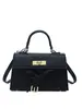 Bolsa de mujer de venta caliente transfronteriza otoño 2026 nuevo súper popular nicho platino bolso Kelly versátil bolso de hombro y bandolera