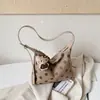 Bolso de gran capacidad para mujer, nuevo y popular bolso de hombro y axila de lunares 2026, bolso de mano pequeño elegante y único
