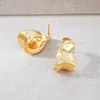 Pendientes de aro grandes geométricos con acabado cepillado, pendientes exagerados de lujo ligero de alta gama, pendientes elegantes de nicho de lujo ligero metálicos mate