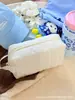 Bolsa de maquillaje acolchada de color sólido con lunares transfronteriza, bolsa de almacenamiento de gran capacidad, neceser, bolsa de viaje simple y portátil, estuche para lápices