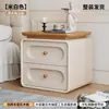 Mesita de noche usada para dormitorio en casa 2026 Nuevo Crema Lujo Ligero Sensación de Alta Gama Madera Maciza Pequeño Gabinete de Almacenamiento de Mesita de Noche