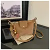 A bolsa de dumpling trançada popular deste ano para mulheres é a nova bolsa de ombro simples da moda de 2026, uma bolsa transversal de nicho estilo coreano