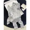 Conjunto completo de suéter con bloques de color de lindo cachorro de dibujos animados, capa base de manga larga y pantalón largo, conjunto de ropa interior cálida cepillada de terciopelo alemán para mujer