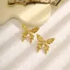 Pendientes Retro de Rayas Verticales Estilo Europeo y Americano Estilo Lujo Ligero Acero Inoxidable Corazón Hueco Pendientes de Mariposa Pendientes de Nicho para Mujer
