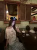 2026 Novo Estilo de Verão Blusa de Ombro Caído para Mulheres, Estampa Fofa de Cabeça de Gatinho Gato Manga Curta Preguiçosa Solta Tendência