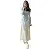 Diseño dulce y elegante, falda midi acanalada blanca, nuevo modelo de otoño 2026, efecto de caída, falda larga de cintura alta adelgazante