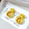 Tienda de Oro Mismo Estilo Oro Antiguo Incrustado con Diamantes Cepillado Calabaza Giratoria Bolsa de la Suerte Colgante Nuevo Chino Versátil Colgante de Bolsa de la Suerte