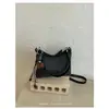 Bolso vintage de gran capacidad transfronterizo para mujer, nuevo bolso cruzado casual versátil de otoño 2026, bolso de hombro de lona para debajo del brazo