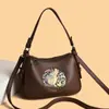 Nova Bolsa Feminina da Moda Transfronteiriça Primavera 2026 com Relevo de Elefante, Grande Capacidade, Versátil para o Dia a Dia, Bolsa de Ombro Cruzada Macia Estilo Retrô