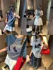 Moqie Diseño de Nicho Cuadros Parche Dibujos Animados Cachorro Cuello Redondo Holgado Aspecto Adelgazante Manga Corta Camiseta Mq0629