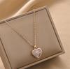 Simples amor Opala 18K banhado a ouro de aço inoxidável coração pingente de titânio colar de aço jóias femininas versáteis atacado