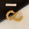 Pendientes de aro redondos plisados de circonita cúbica estilo metal transfronterizos europeos y americanos, modernos y elegantes, con un toque de lujo y sofisticación