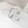 Anillo de Pareja Asimétrico con Flor de Diamante Incrustada con Pegamento Azul de Plata de Ley S925 Nalan R03483