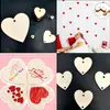 Venta al por mayor de fábrica artesanías de madera forma de corazón de madera accesorios hechos a mano para jardín de infantes con agujeros virutas de madera de amor