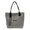 Bolsa de Lona de Grande Capacidade para Mulheres, Novo Estilo de Nicho, Bolsa de Ombro Listrada Versátil, Bolsa Tote para Aula de Estudante e Deslocamento
