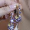 2024 nueva moda atmósfera moda púrpura anillo de diamantes completo aretes versátiles personalidad diseño nicho aretes exquisitos