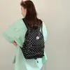 Mochila casual versátil nueva y linda de lunares para mujer, adecuada para estudiantes de secundaria y preparatoria, mochila elegante para el día a día para mujeres
