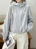 Chaqueta de trabajo con capucha para estudiante de mujer, primavera y otoño 2026, chaqueta deportiva popular de moda de corte holgado